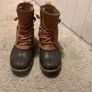 L.L. Bean Boots size CM (7 Medium) but I typically wear 8.5/9 in regular shoes.